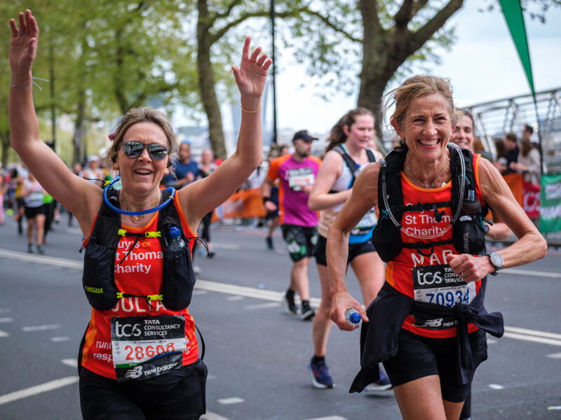 An image of two runners for Guy's and St Thomas' Charity
