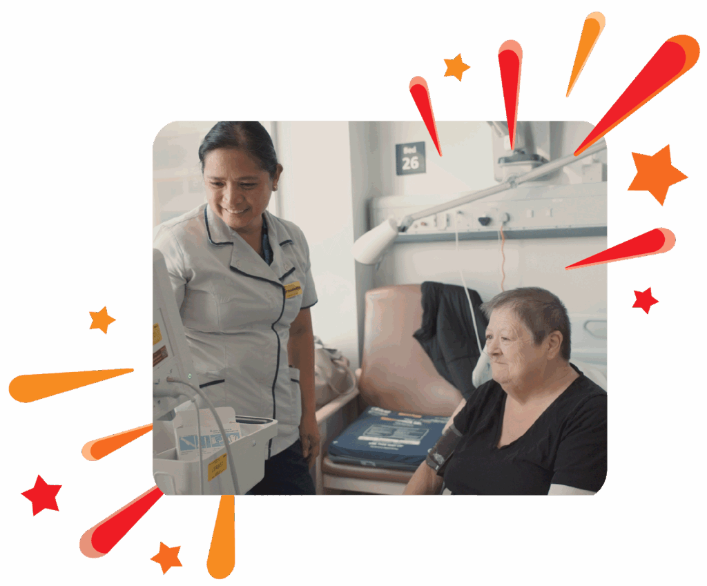 Patient getting her blood pressure monitored by a nurse at Guy