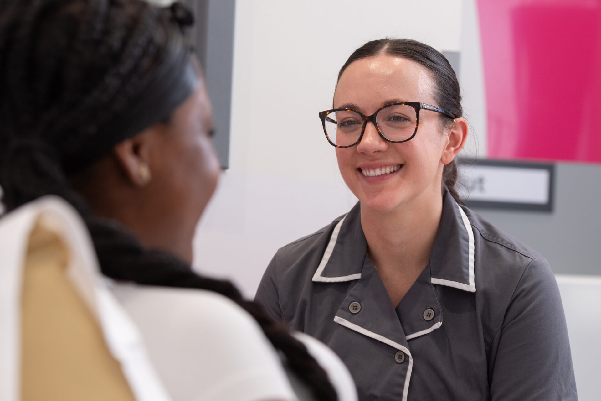 Image of Hannah, a nurse at Guy's and St Thomas' with a patient