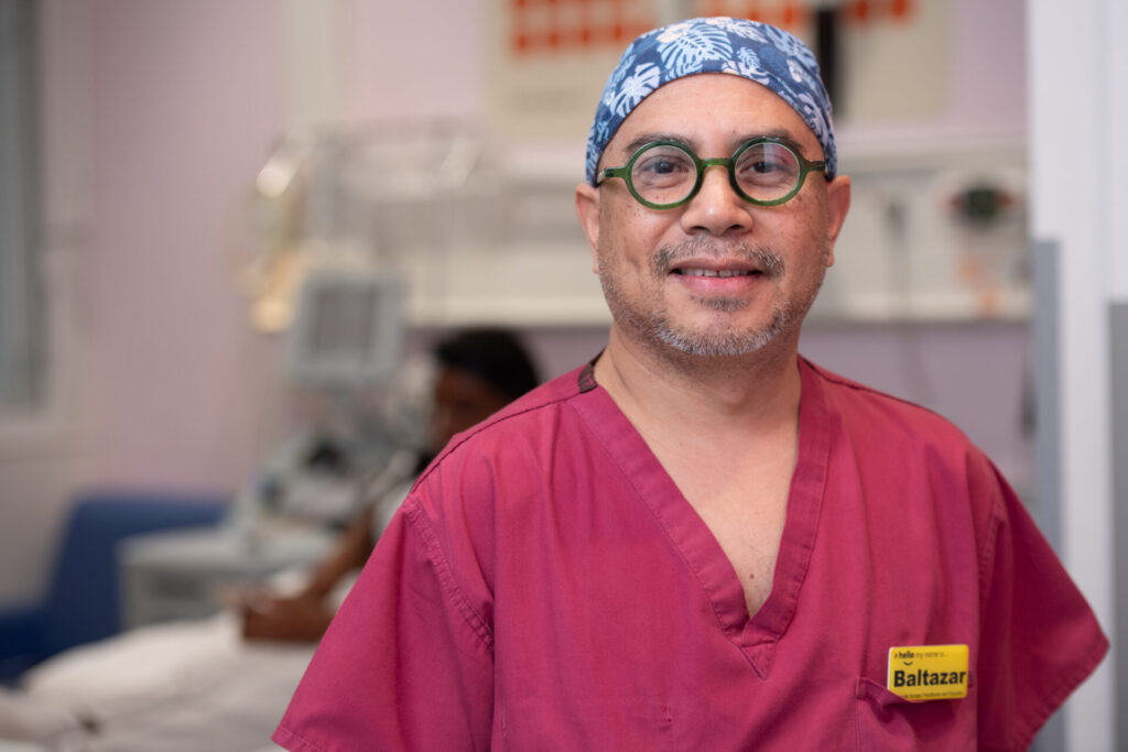 Image of a staff member in scrubs in the Sickle Cell Unit