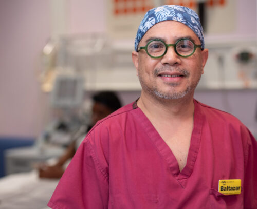 Image of a staff member in scrubs in the Sickle Cell Unit
